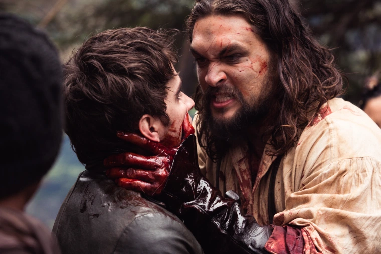 Michael Smyth (Landon Liboiron) and Declan Harp (Jason Momoa) in Frontier, the six-episode, one-hour drama from NETFLIX series currently shooting in Newfoundland, Canada. FRONTIER follows the chaotic and violent struggle to control wealth and power in the North American fur trade of the late 18th century, created by Rob Blackie and Peter Blackie, directed by Brad Peyton.​ ​Photo credit: Duncan de Young